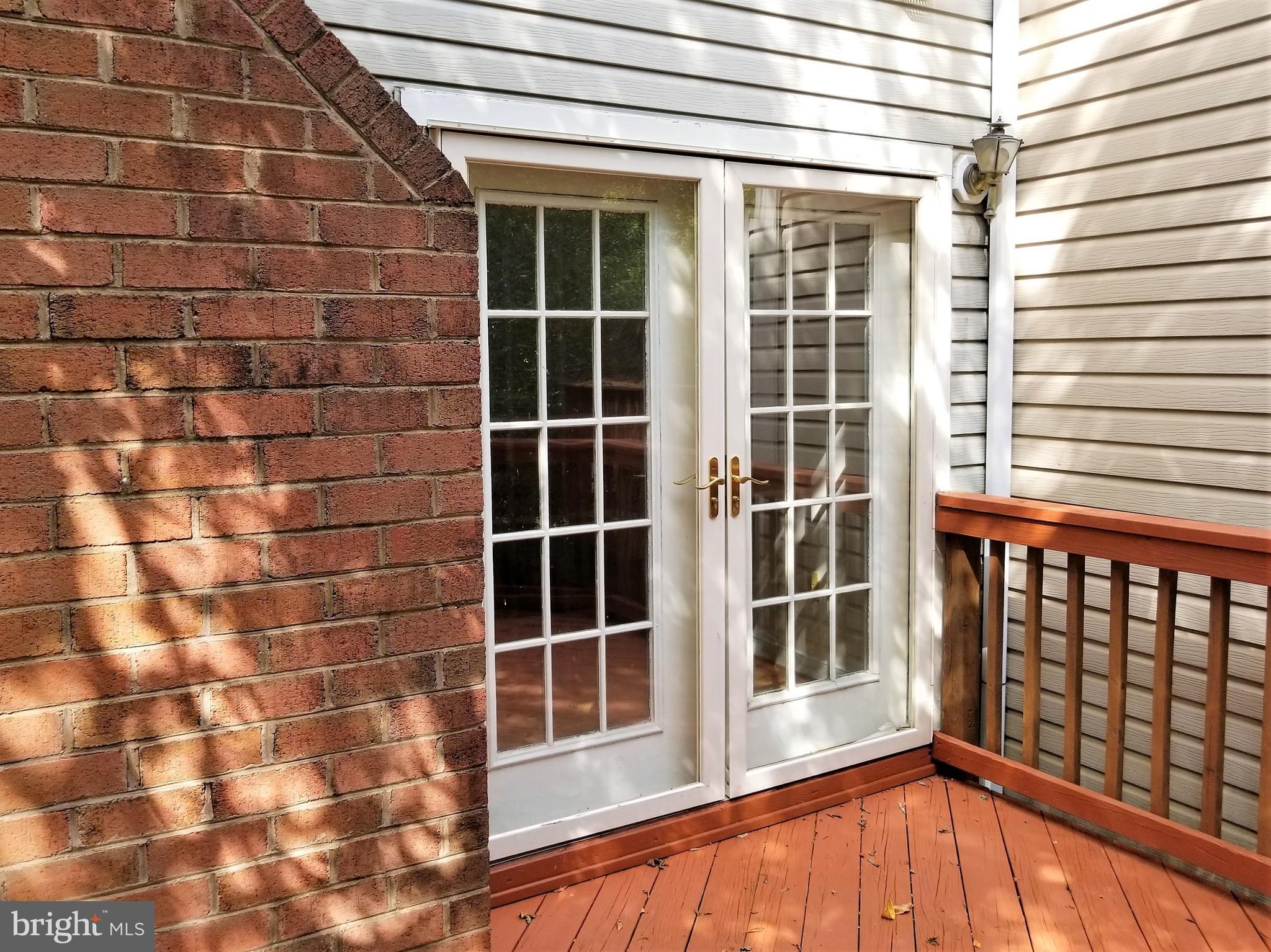 10955 Rocky Mt Way Silver Spring, MD 20902 - Photo 11 of 30 a view of a balcony with a large window