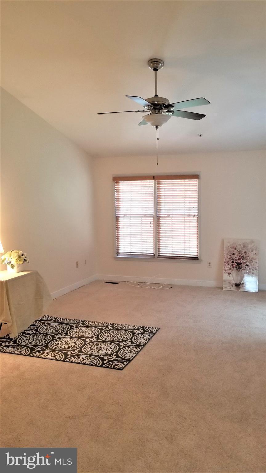 10955 Rocky Mt Way Silver Spring, MD 20902 - Photo 15 of 30 an empty room with windows