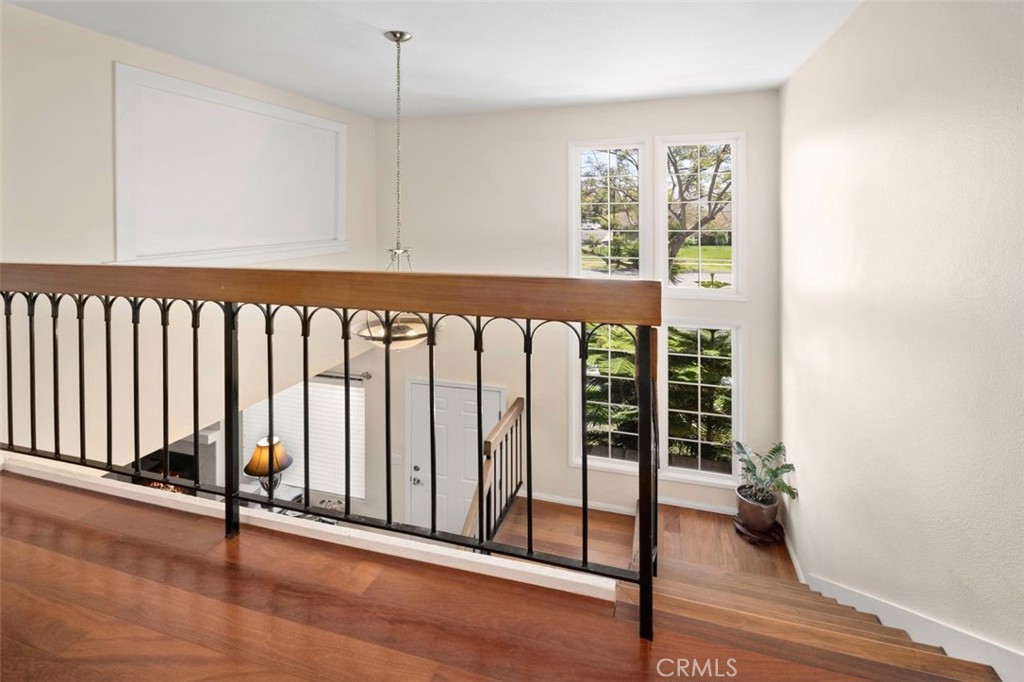 13 West Yale Loop, Unit 2 Irvine, CA 92604 - Photo 24 of 39 an entryway with wooden floor and windows