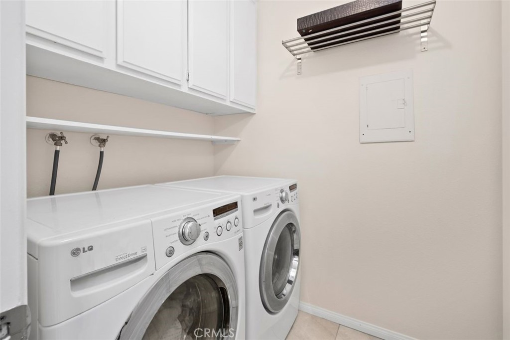 13 West Yale Loop, Unit 2 Irvine, CA 92604 - Photo 32 of 39 a utility room with dryer and washer
