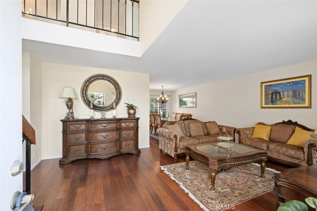 13 West Yale Loop, Unit 2 Irvine, CA 92604 - Photo 6 of 39 a living room with furniture and a wooden floor