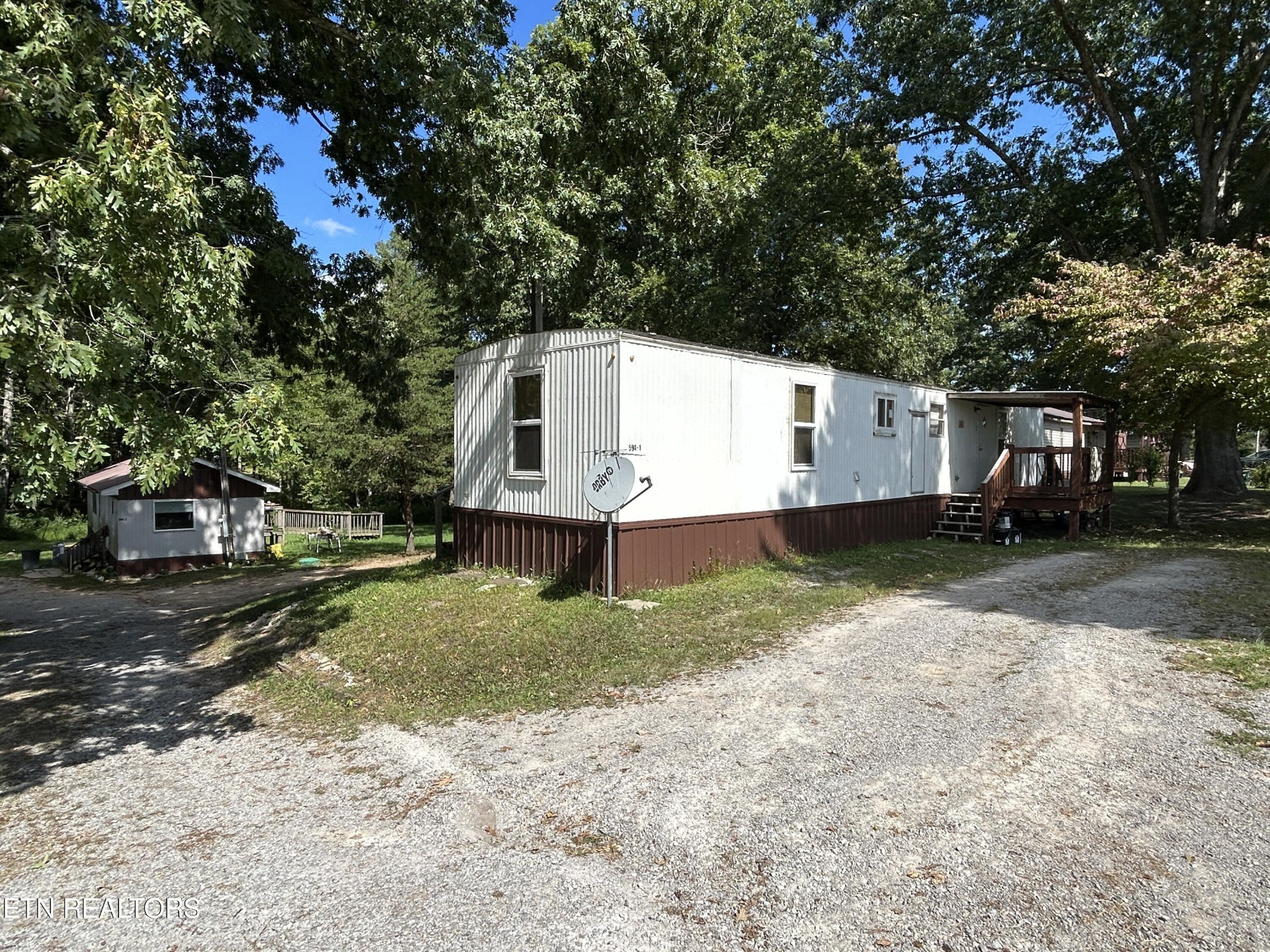 594 Fairgrounds Road Jamestown, TN 38556 - Photo 1 of 3 a view of a house with a yard