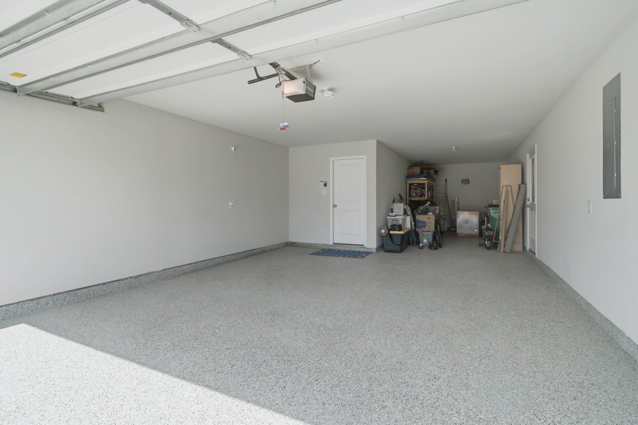10110 Whitney Reach Drive Rosharon, TX 77583 - Photo 35 of 50 3 Car Tandem Garage w/ Epoxy Flooring