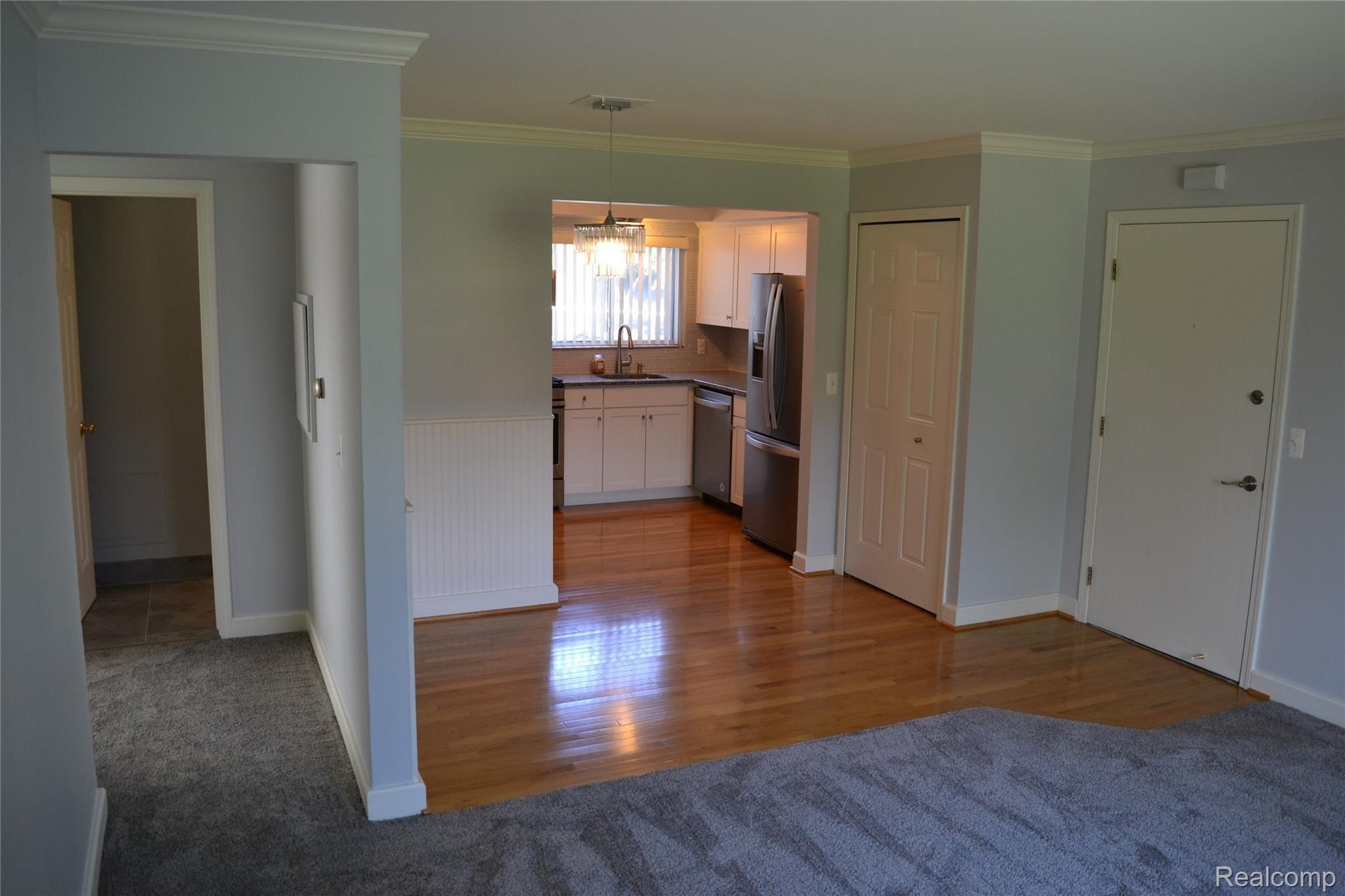 451 Miller Avenue, Unit 111 Rochester, MI 48307 - Photo 12 of 26 12 - Living Room to Kitchen.JPG