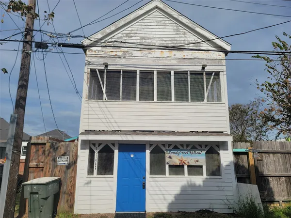 a front view of a house with a garage