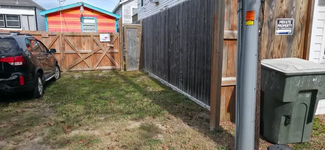 a bed room with a bed and a chair