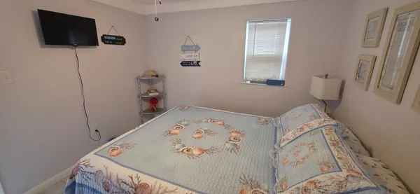 a kitchen with a microwave and a sink