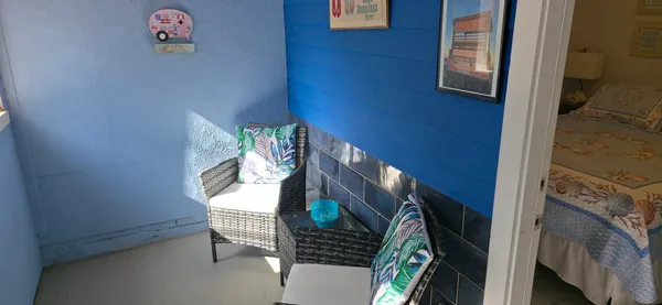 a view of an empty room with windows