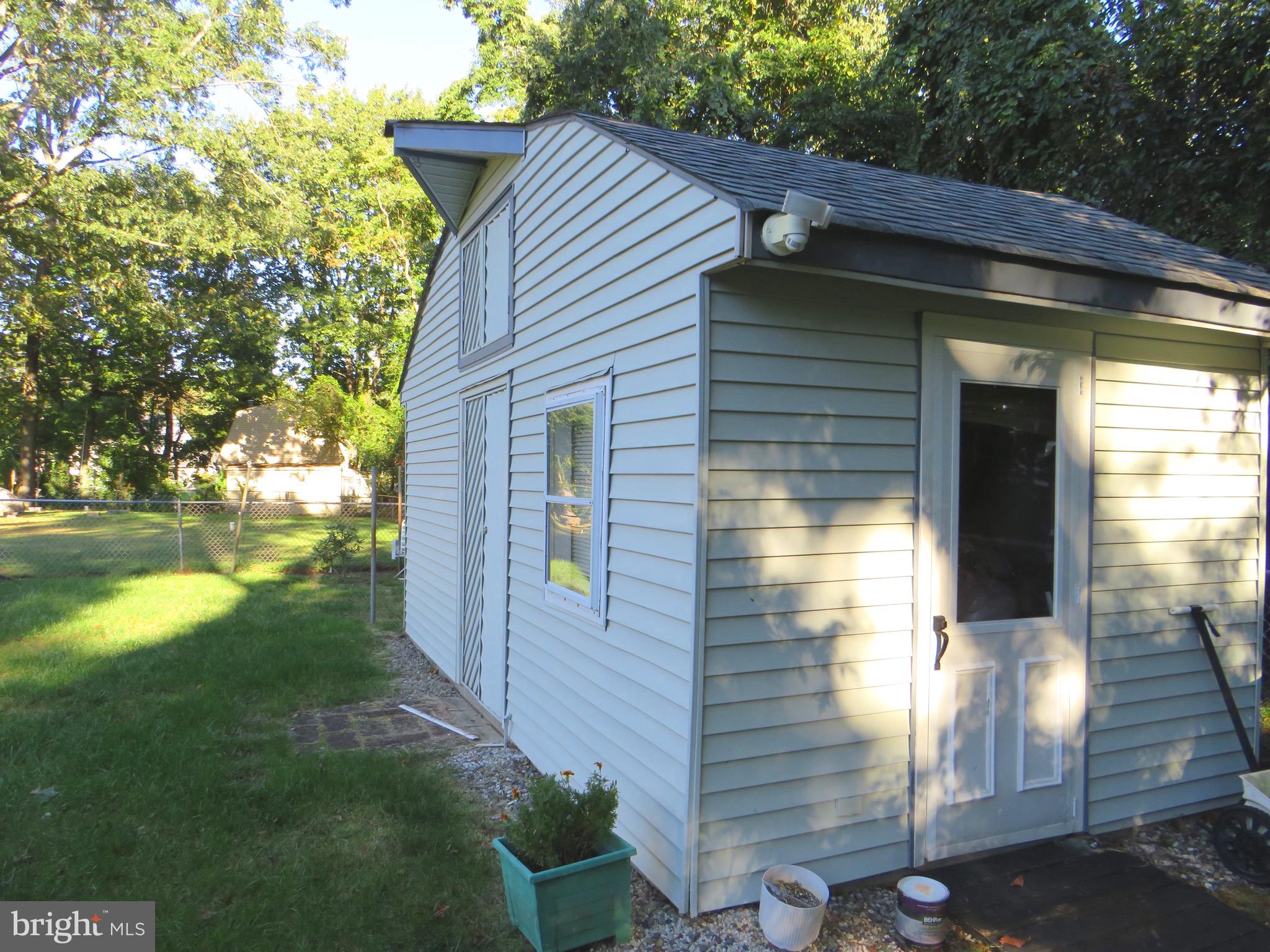 104 Prospect Road Sicklerville, NJ 08081 - Photo 21 of 23 Large storage shed/work shed with 2 entrances