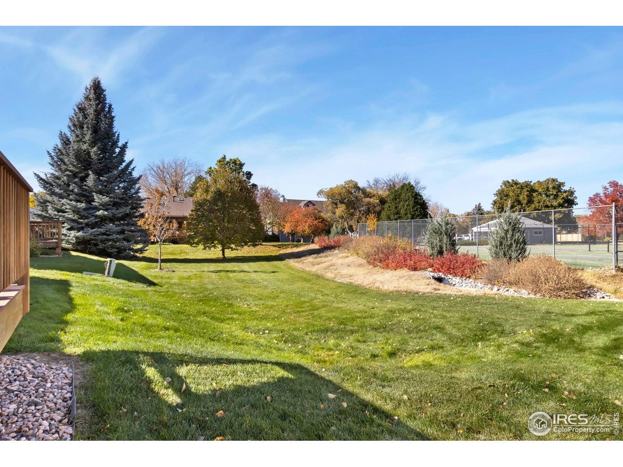 a view of yard with swimming pool