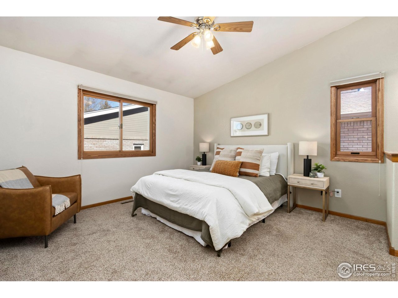 1531 West Swallow Road, Unit 28 Fort Collins, CO 80526 - Photo 12 of 23 a bedroom with a bed and window