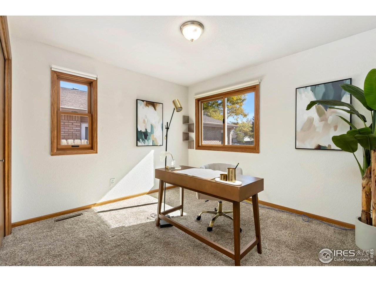 1531 West Swallow Road, Unit 28 Fort Collins, CO 80526 - Photo 14 of 23 a living room with furniture and a window