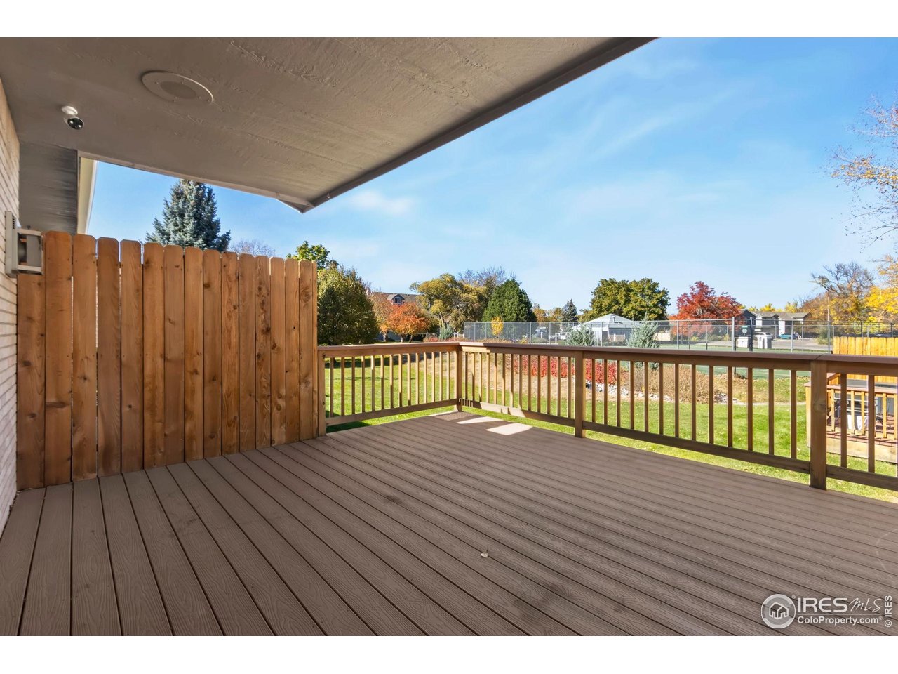 1531 West Swallow Road, Unit 28 Fort Collins, CO 80526 - Photo 22 of 23 a view of balcony with wooden floor