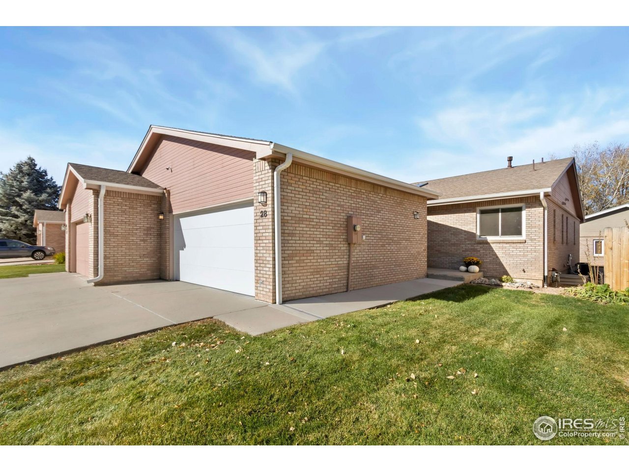 1531 West Swallow Road, Unit 28 Fort Collins, CO 80526 - Photo 23 of 23 a house view with a backyard space