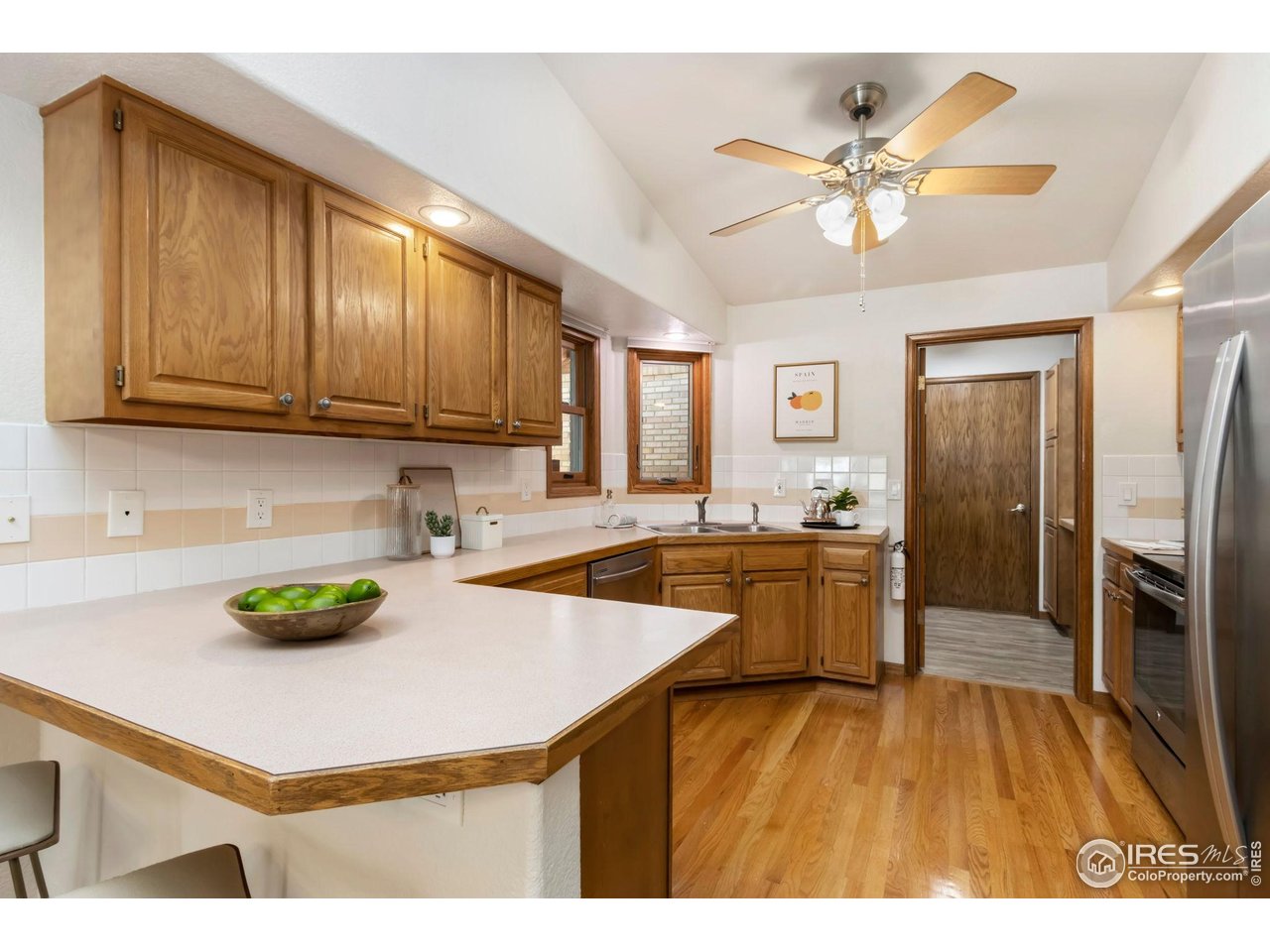 1531 West Swallow Road, Unit 28 Fort Collins, CO 80526 - Photo 10 of 23 a kitchen with a sink appliances and cabinets
