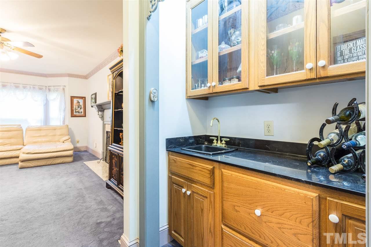 8329 Glory Road Zebulon, NC 27597 - Photo 13 of 30 In the Den area, you have a great butlers pantry, wet bar or coffee station. What is better than a great Hot Cocoa Station while sitting next to a cozy fire?