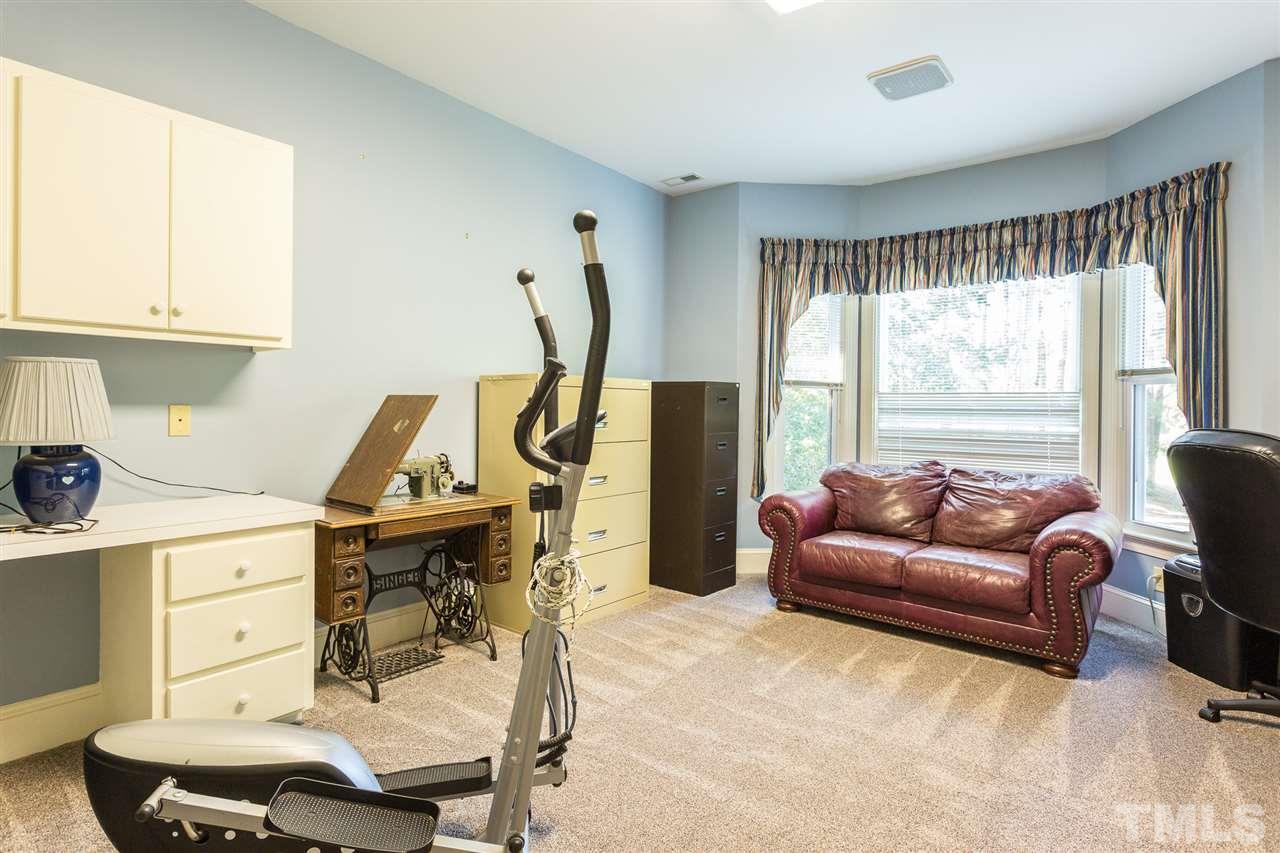 8329 Glory Road Zebulon, NC 27597 - Photo 24 of 30 This space is perfect for an office or virtual learning space. Very bright with a large bay window and large walk-in closet. You could easily have 3 separate work stations in this space or convert to a craft room or Nursery. So many possibilities!