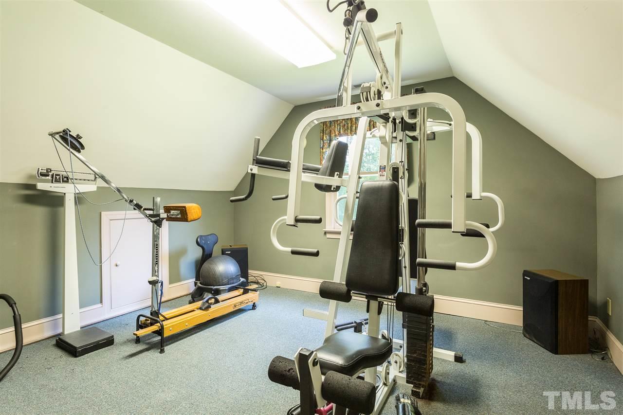 8329 Glory Road Zebulon, NC 27597 - Photo 27 of 30 This tucked away space allows you to get your fitness going without being in the way. Not too small at 11.3 x 13.3 and has Attic storage access here as well. Seller will consider leaving the gym equipment for the right Selling Price.