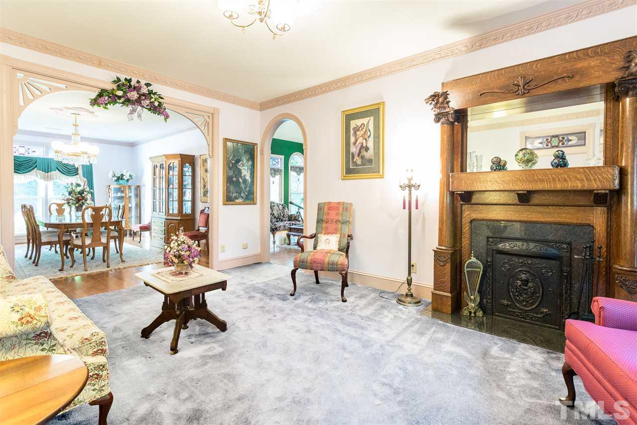 8329 Glory Road Zebulon, NC 27597 - Photo 4 of 30 This beautiful Sitting Parlor adjoins the Dining Room & Sunroom. Imagine celebrating the holidays in this beautiful setting. It will be easy to entertain large groups of friends/family. This room has brand new neutral colored carpet!