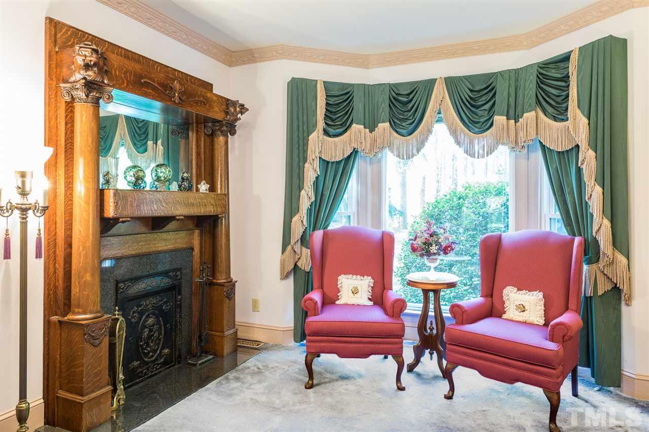 8329 Glory Road Zebulon, NC 27597 - Photo 5 of 30 There are so many seating options for enjoying a nice cup of coffee in the morning! You have this sitting area with Bay window that overlooks the front yard, gorgeous Sunroom, Screened porch, Study, breakfast nook or in the Den next to a warm fire!