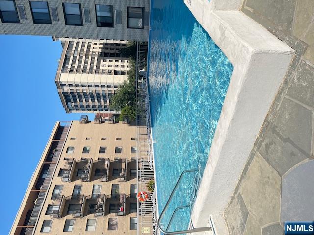 307 Prospect Avenue, Unit 9A Hackensack, NJ 07601 - Photo 19 of 29 front view of building with yard