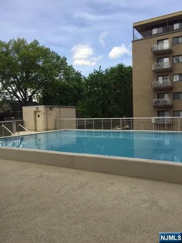 a view of balcony with furniture