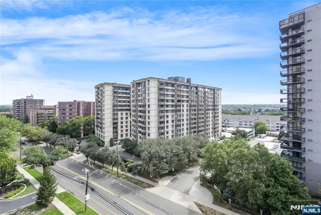 a view of a city with tall buildings in the background