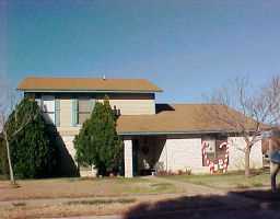 a front view of house with yard