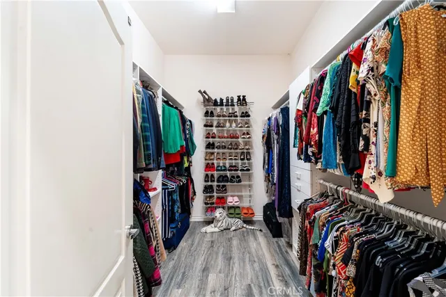 a view of room with window and hardwood floor
