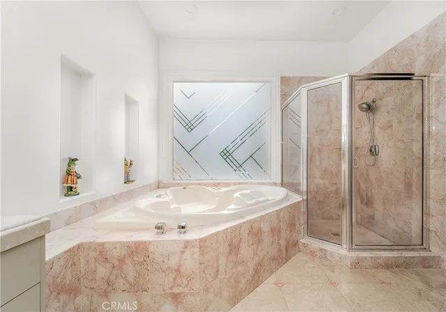 a view of swimming pool with seating space