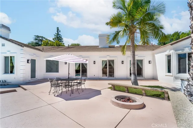 a view of a swimming pool with a yard