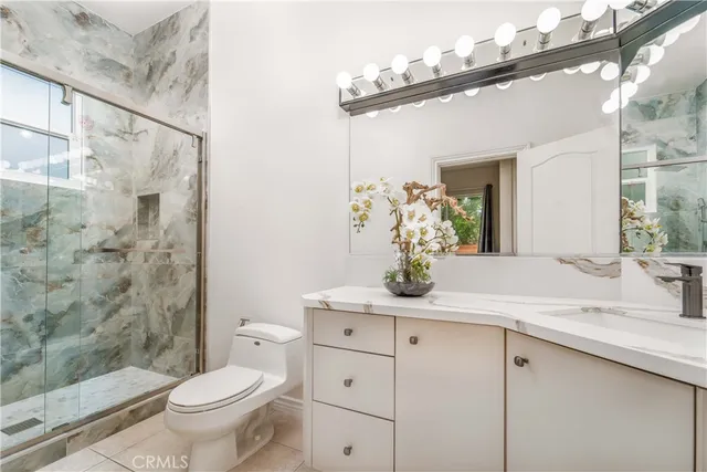 a view of swimming pool with a lounge chair