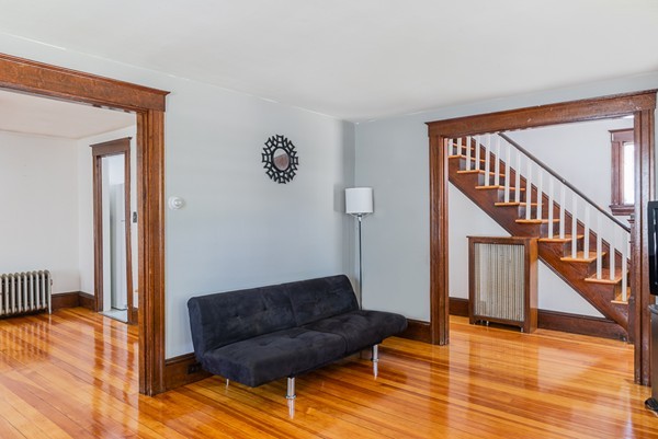 31 Bickford Road Braintree, MA 02184 - Photo 5 of 28 a living room with furniture and a wooden floor