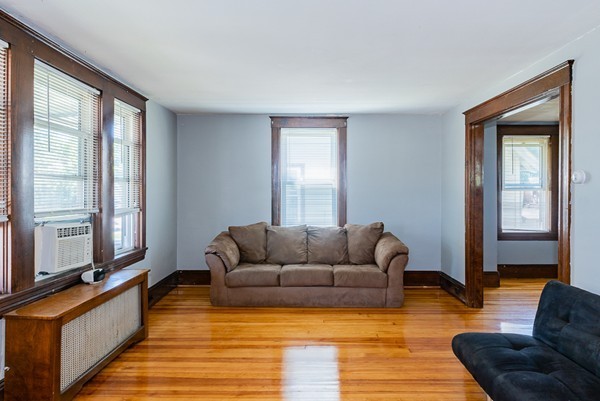 31 Bickford Road Braintree, MA 02184 - Photo 6 of 28 a living room with furniture and a large window