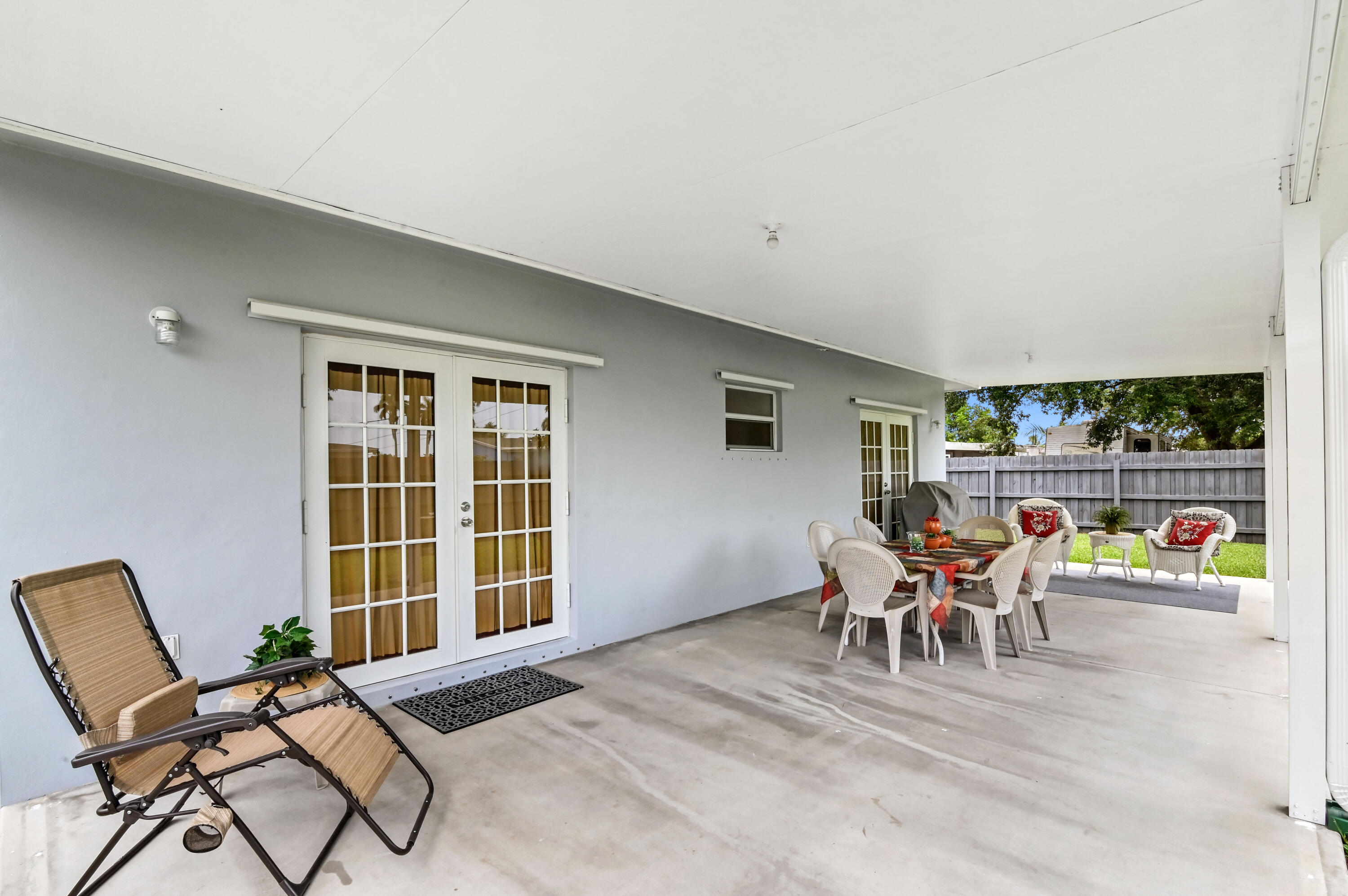 361 East Lake Road Palm Springs, FL 33461 - Photo 24 of 35 23 patio 01