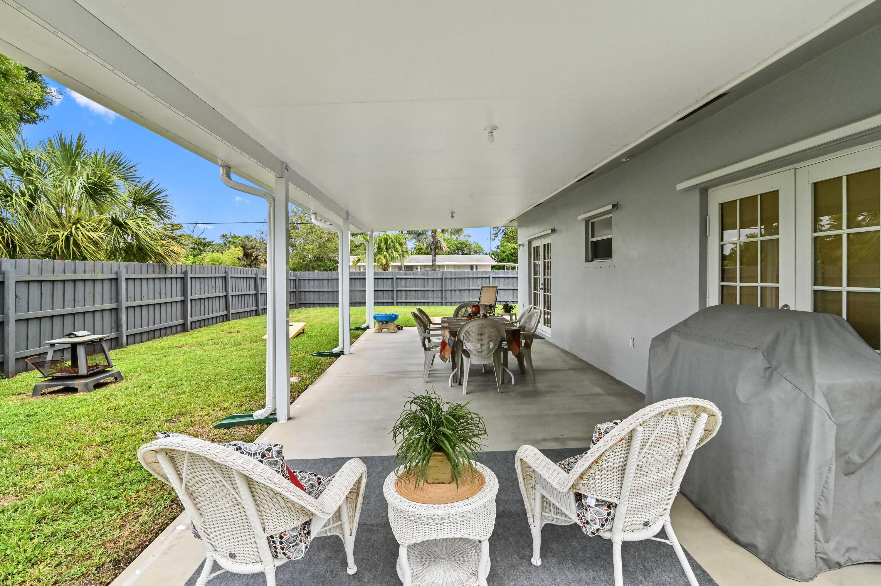 361 East Lake Road Palm Springs, FL 33461 - Photo 25 of 35 24 patio 02