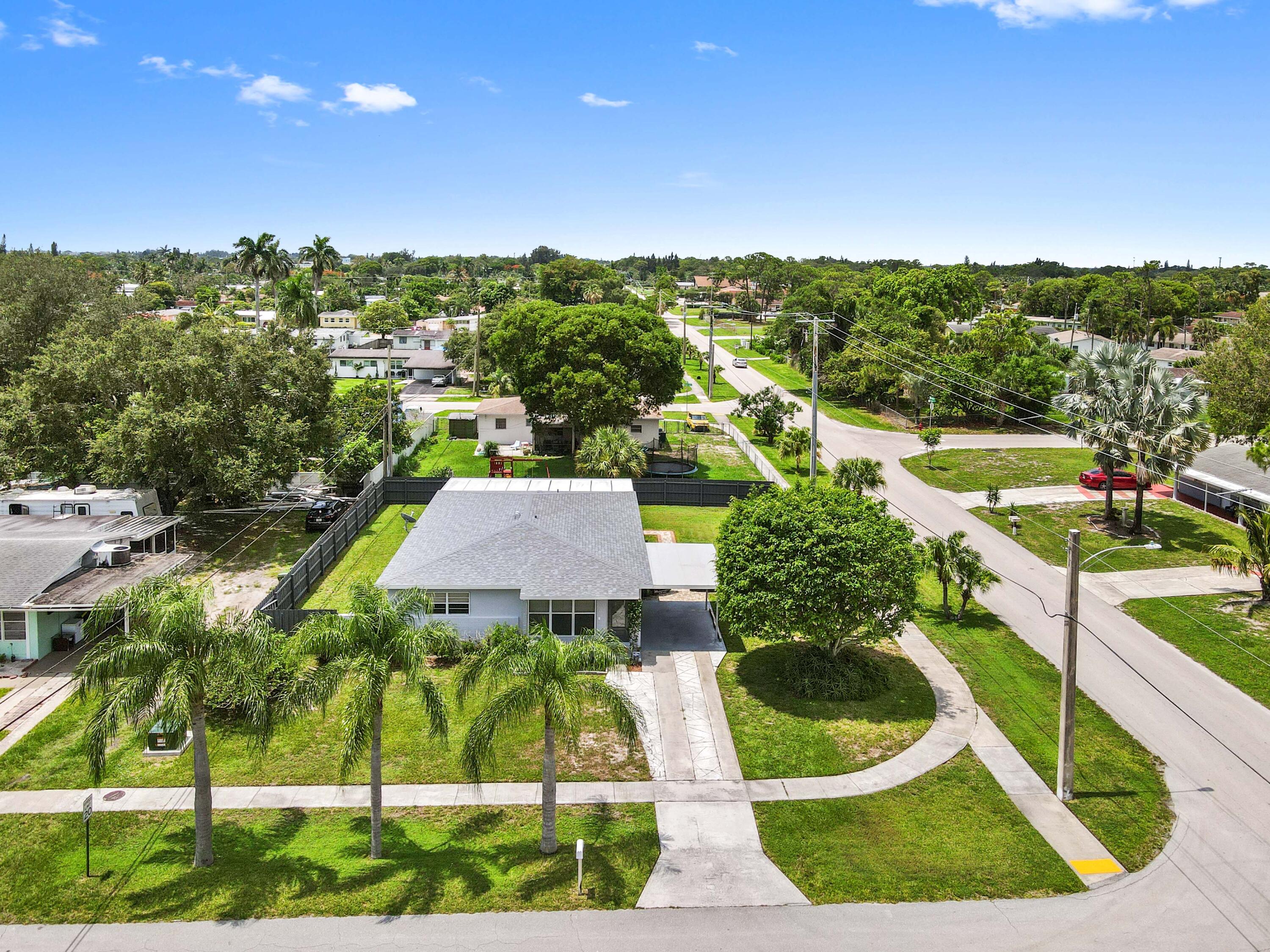 361 East Lake Road Palm Springs, FL 33461 - Photo 28 of 35 27 drone 01