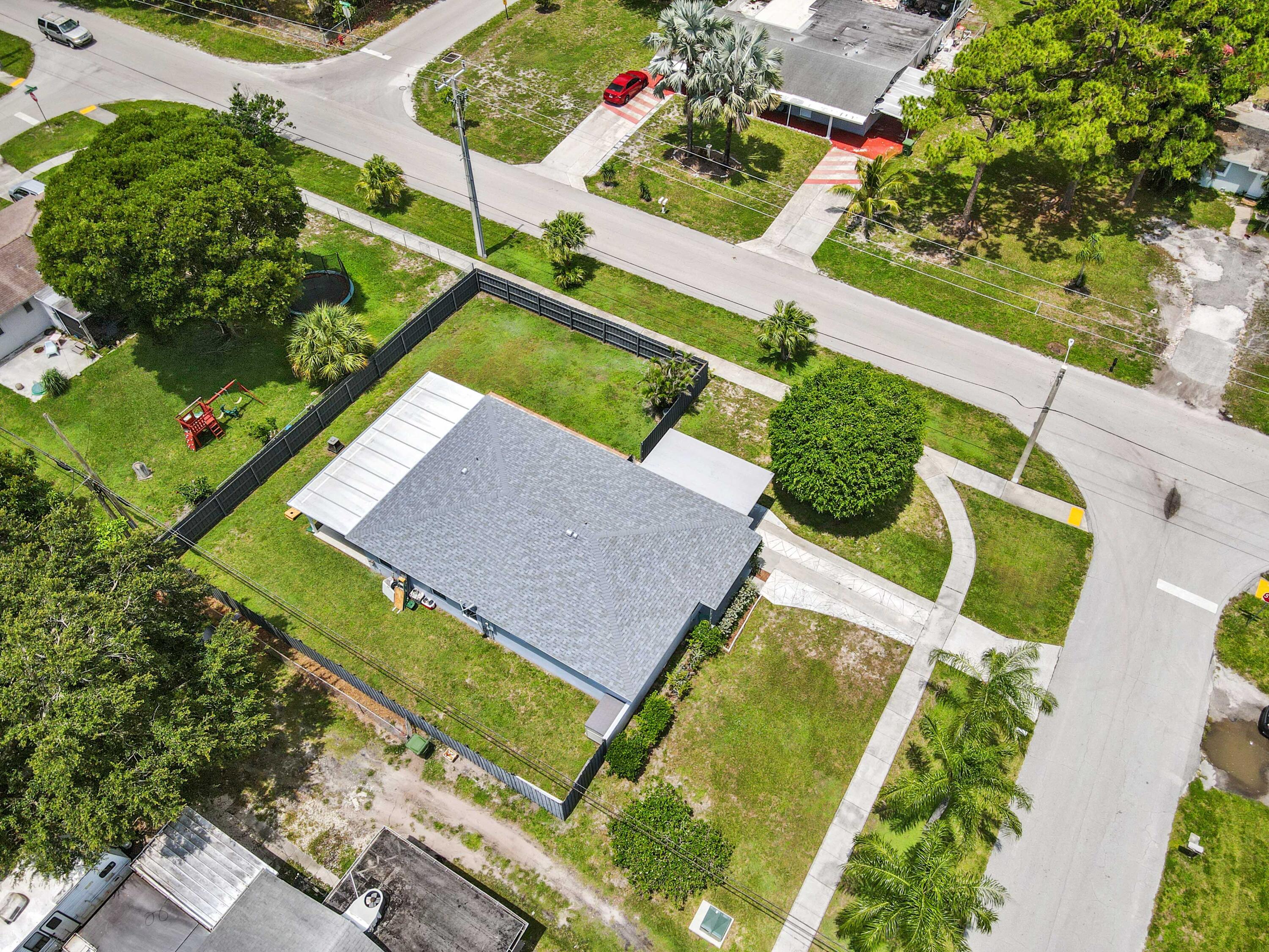 361 East Lake Road Palm Springs, FL 33461 - Photo 34 of 35 34 drone 08
