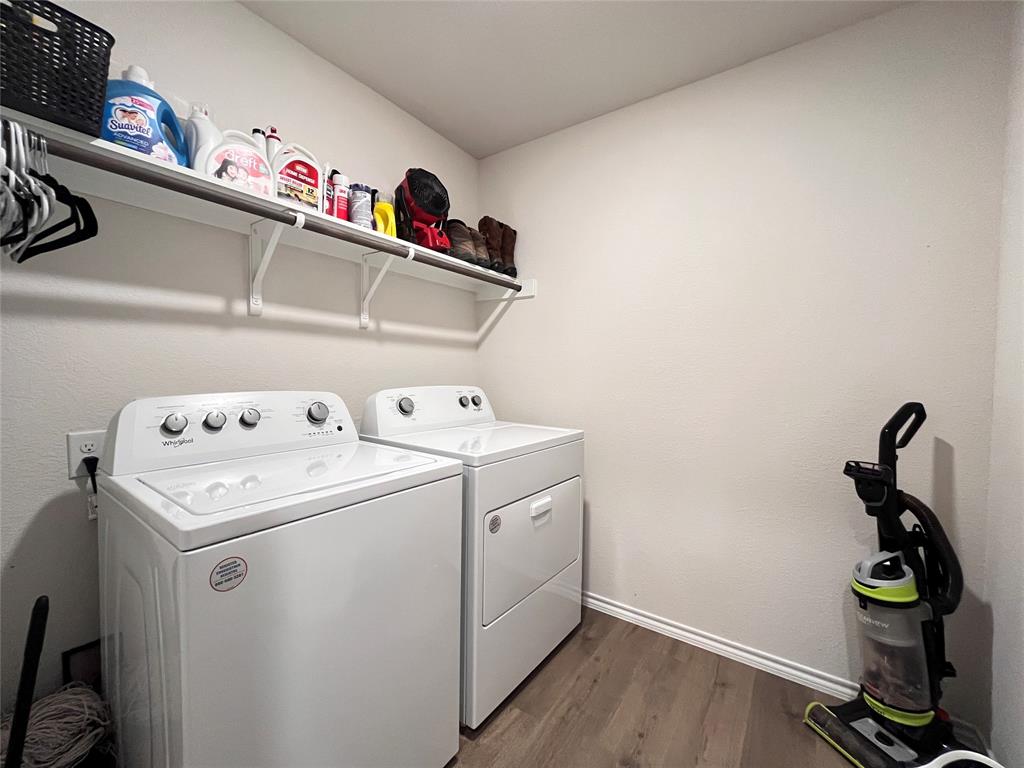 1415 Bent Spur Drive Denton, TX 76207 - Photo 19 of 26 a utility room with dryer and washer