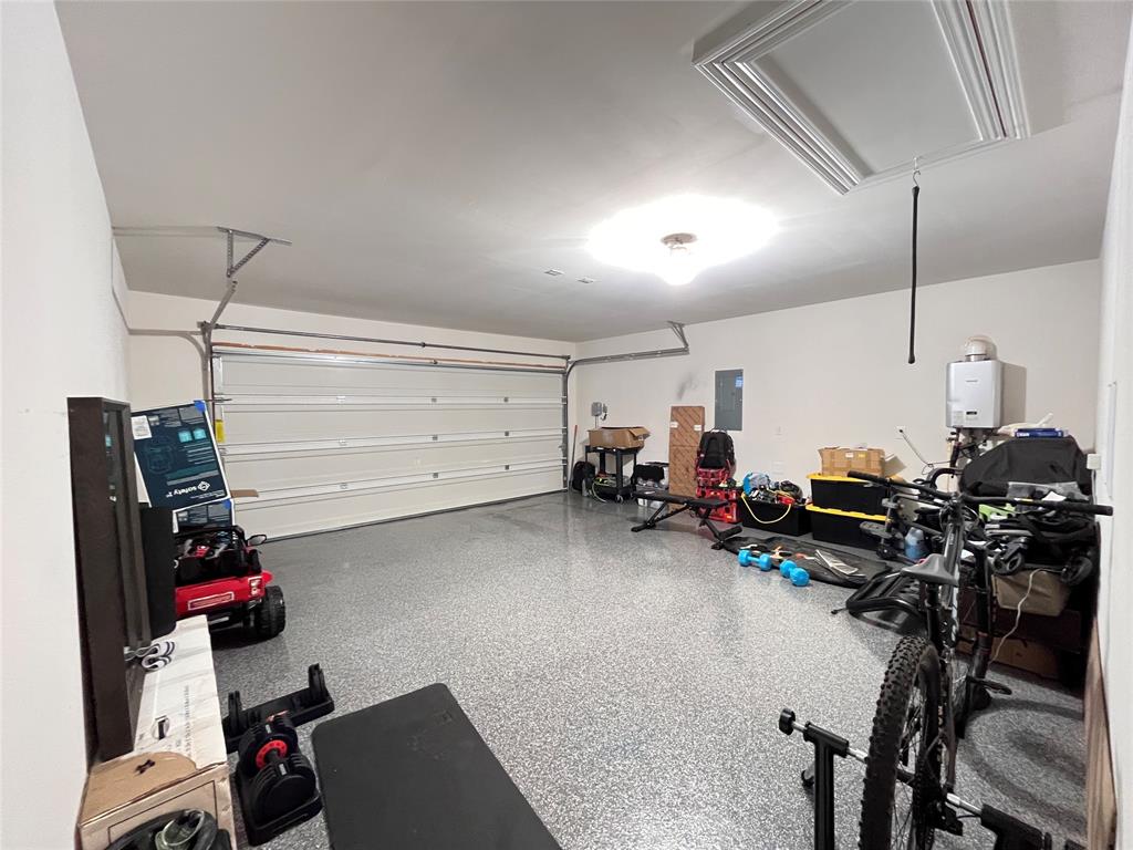 1415 Bent Spur Drive Denton, TX 76207 - Photo 20 of 26 a view of a room with gym equipment