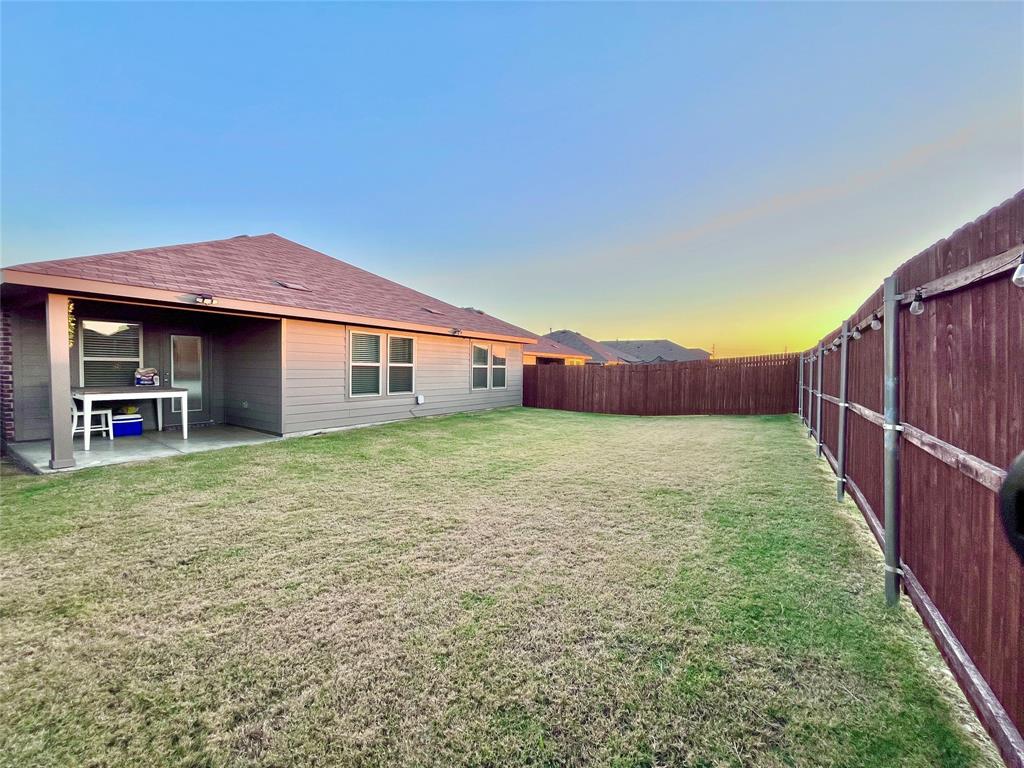 1415 Bent Spur Drive Denton, TX 76207 - Photo 22 of 26 a house view with a garden space