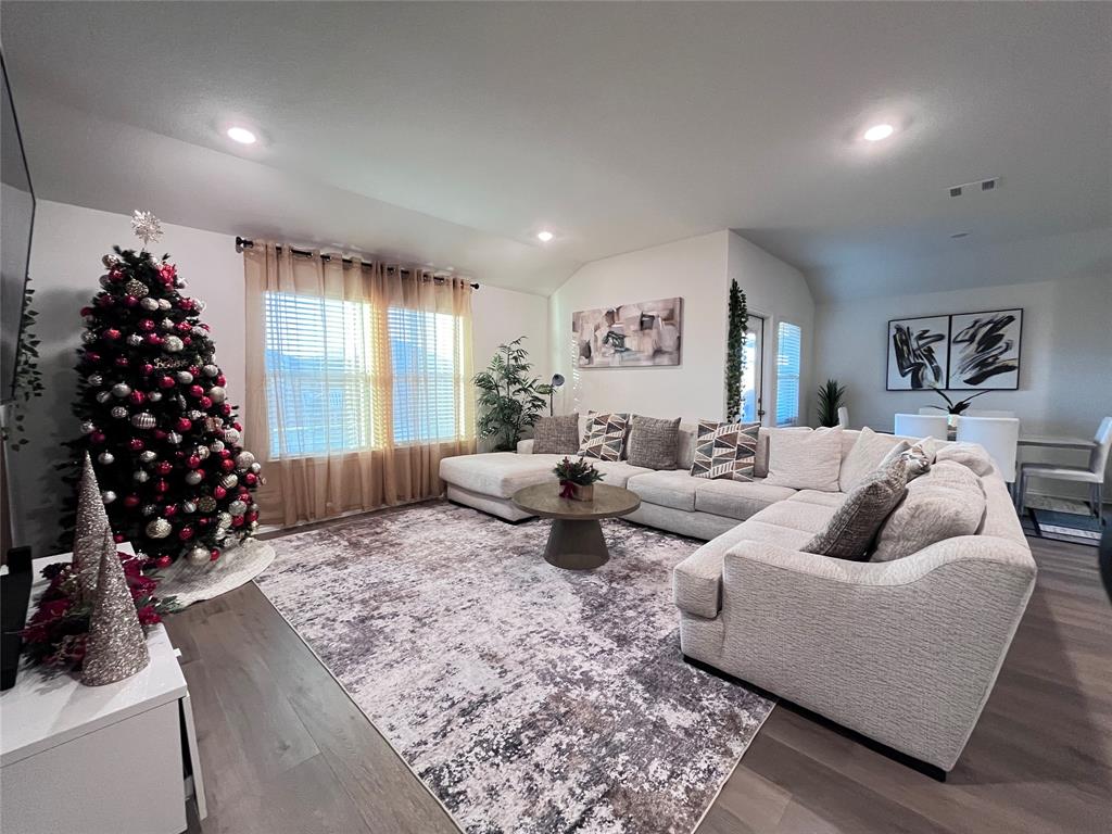 1415 Bent Spur Drive Denton, TX 76207 - Photo 6 of 26 a living room with furniture window and couch