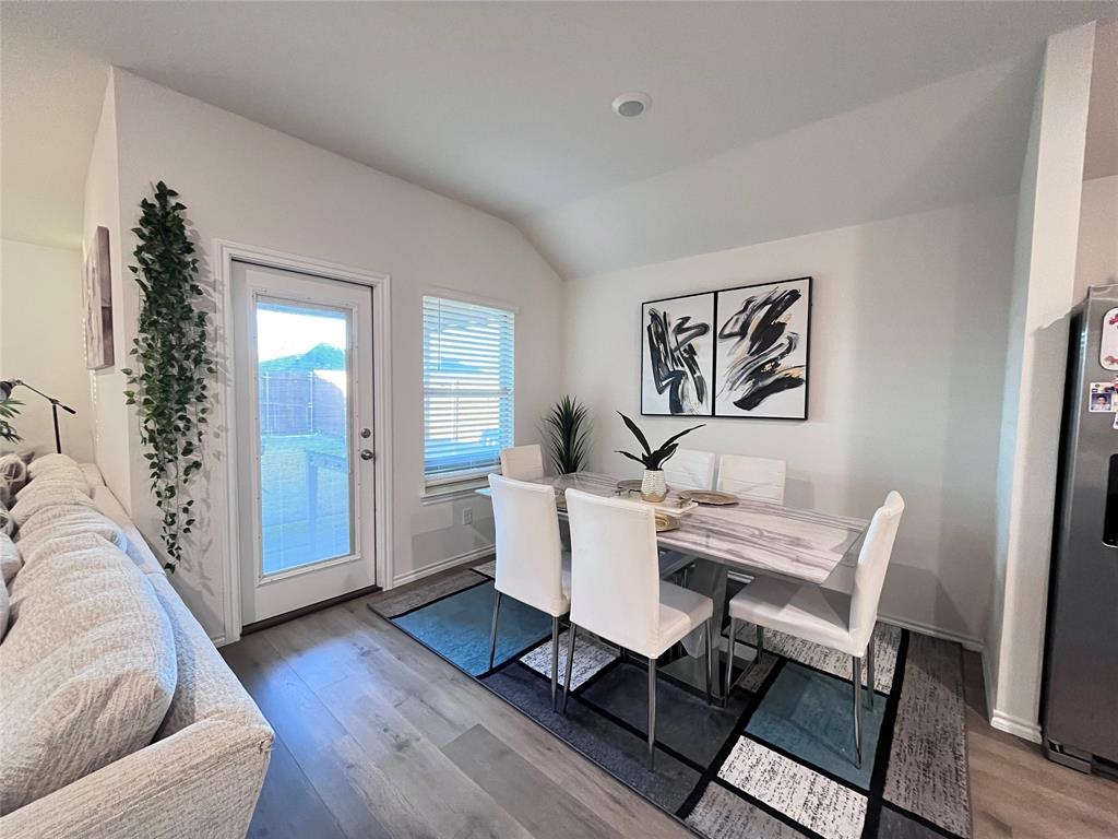 1415 Bent Spur Drive Denton, TX 76207 - Photo 8 of 26 a view of a livingroom with furniture and wooden floor
