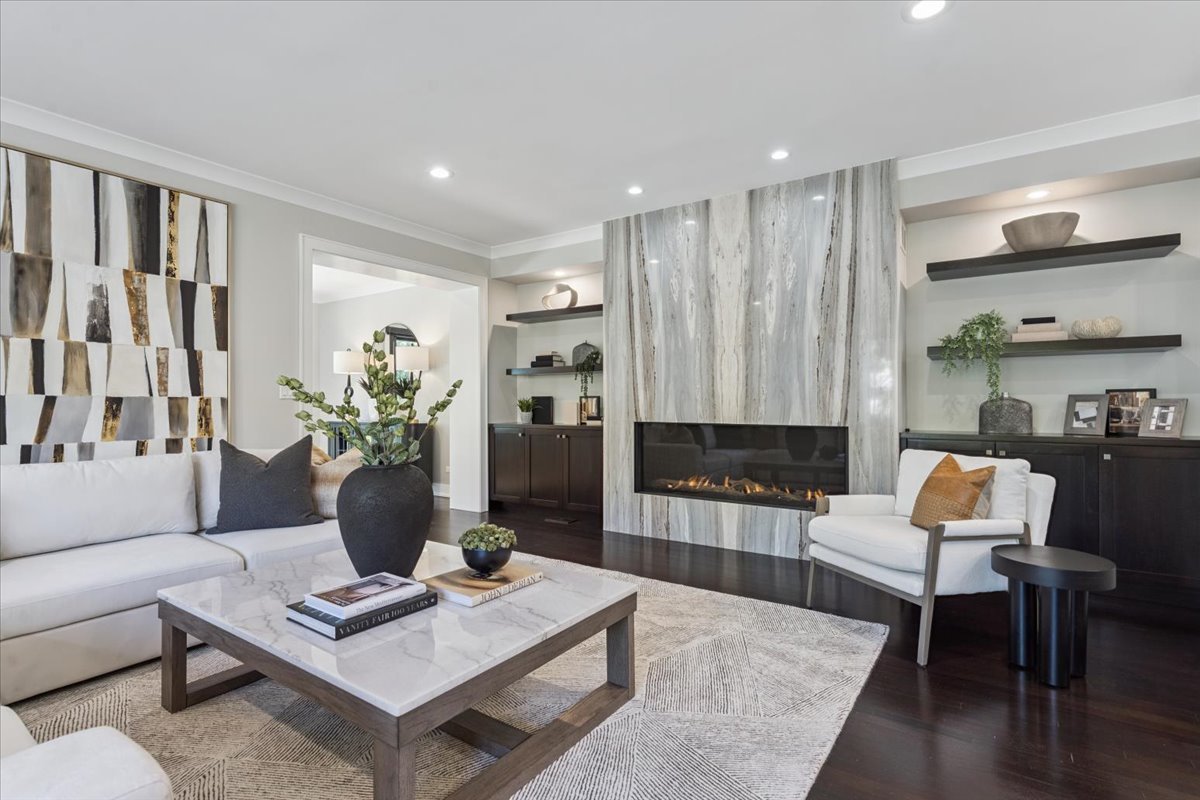 331 Sheridan Road Winnetka, IL 60093 - Photo 21 of 82 a living room with furniture a rug and a fireplace