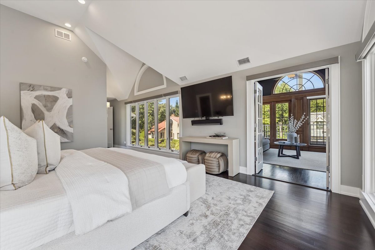 331 Sheridan Road Winnetka, IL 60093 - Photo 46 of 82 a bedroom with a bed window and a flat screen tv