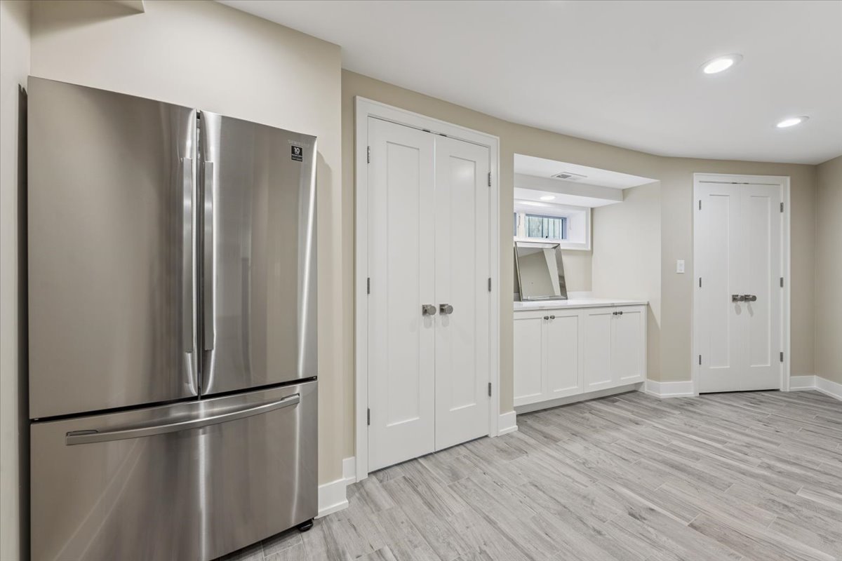 331 Sheridan Road Winnetka, IL 60093 - Photo 69 of 82 a view of an empty room with wooden floor and closet area