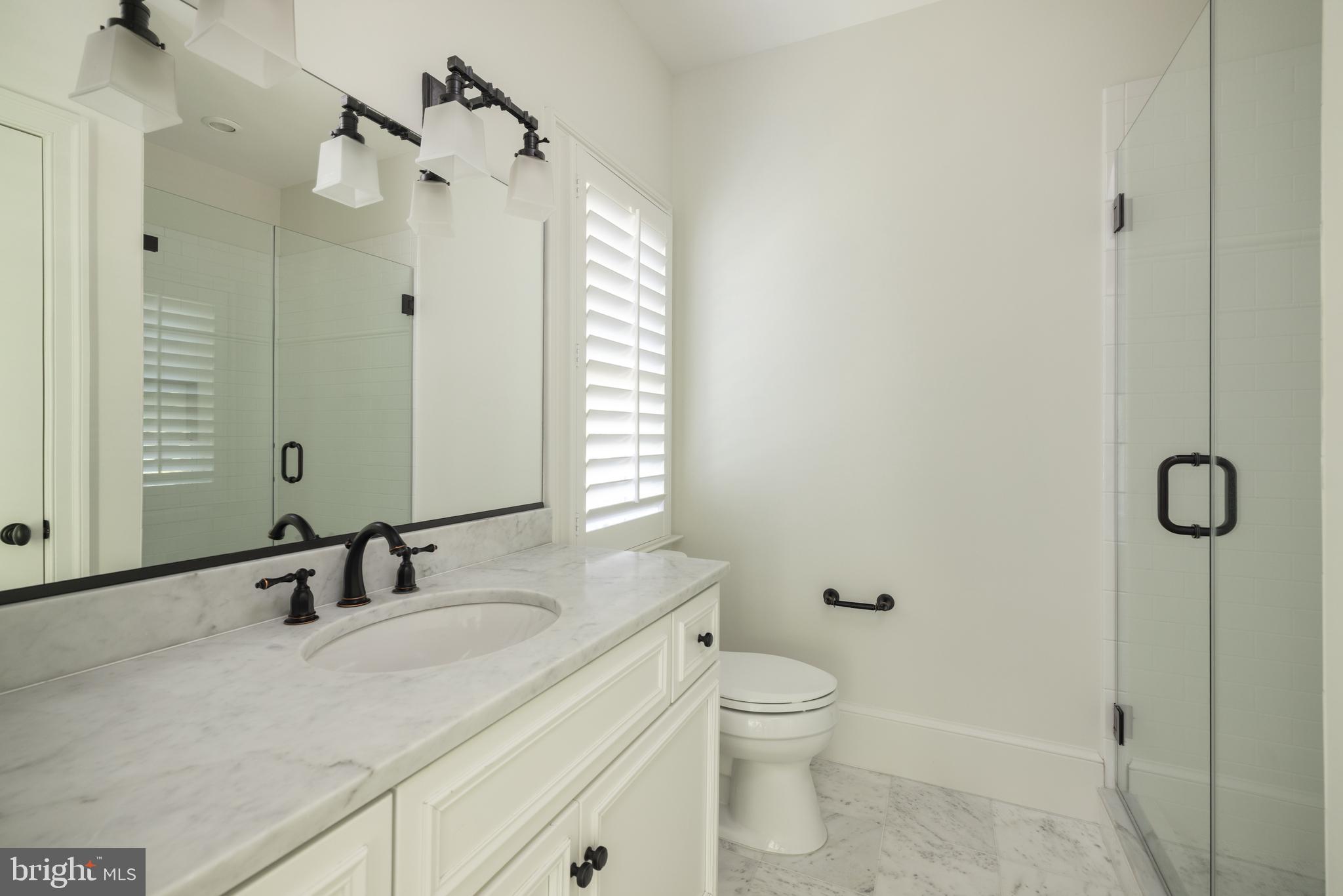 6719 Wemberly Way McLean, VA 22101 - Photo 36 of 50 Well-appointed baths with refined finishes