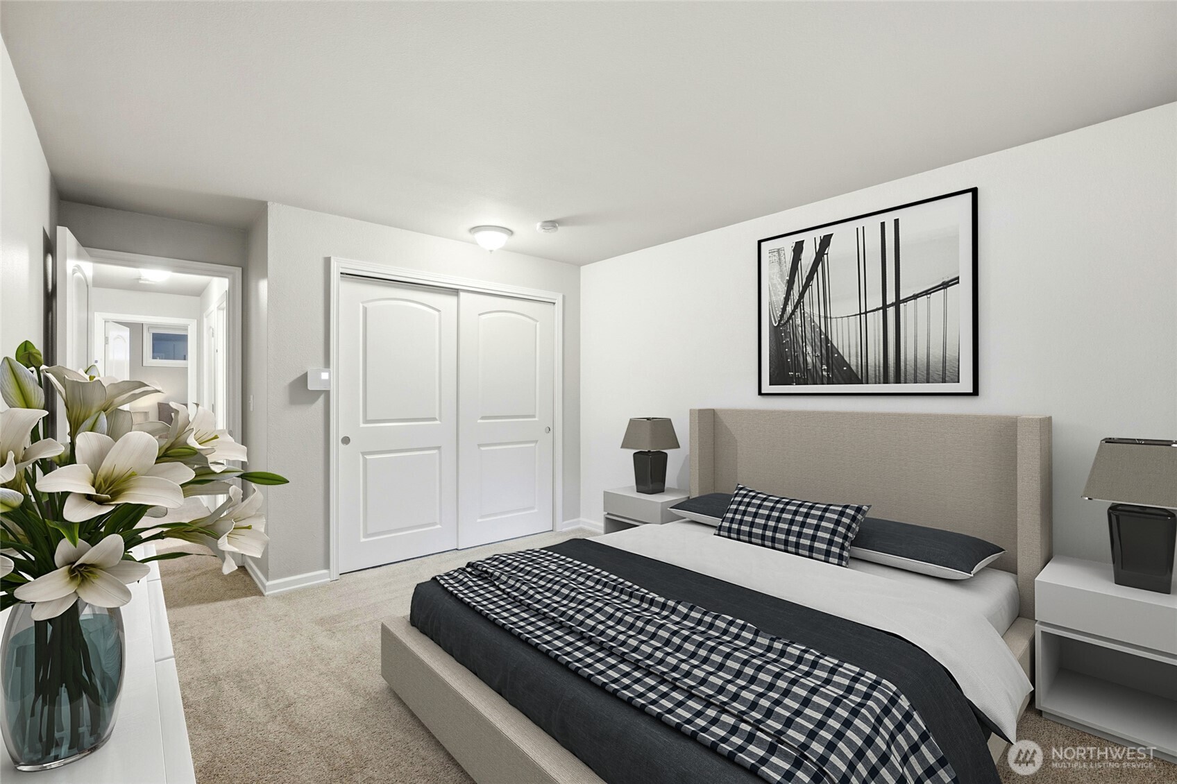 7809 218th Street Southwest, Unit 12 Edmonds, WA 98026 - Photo 19 of 34 a bedroom with a bed and a chandelier