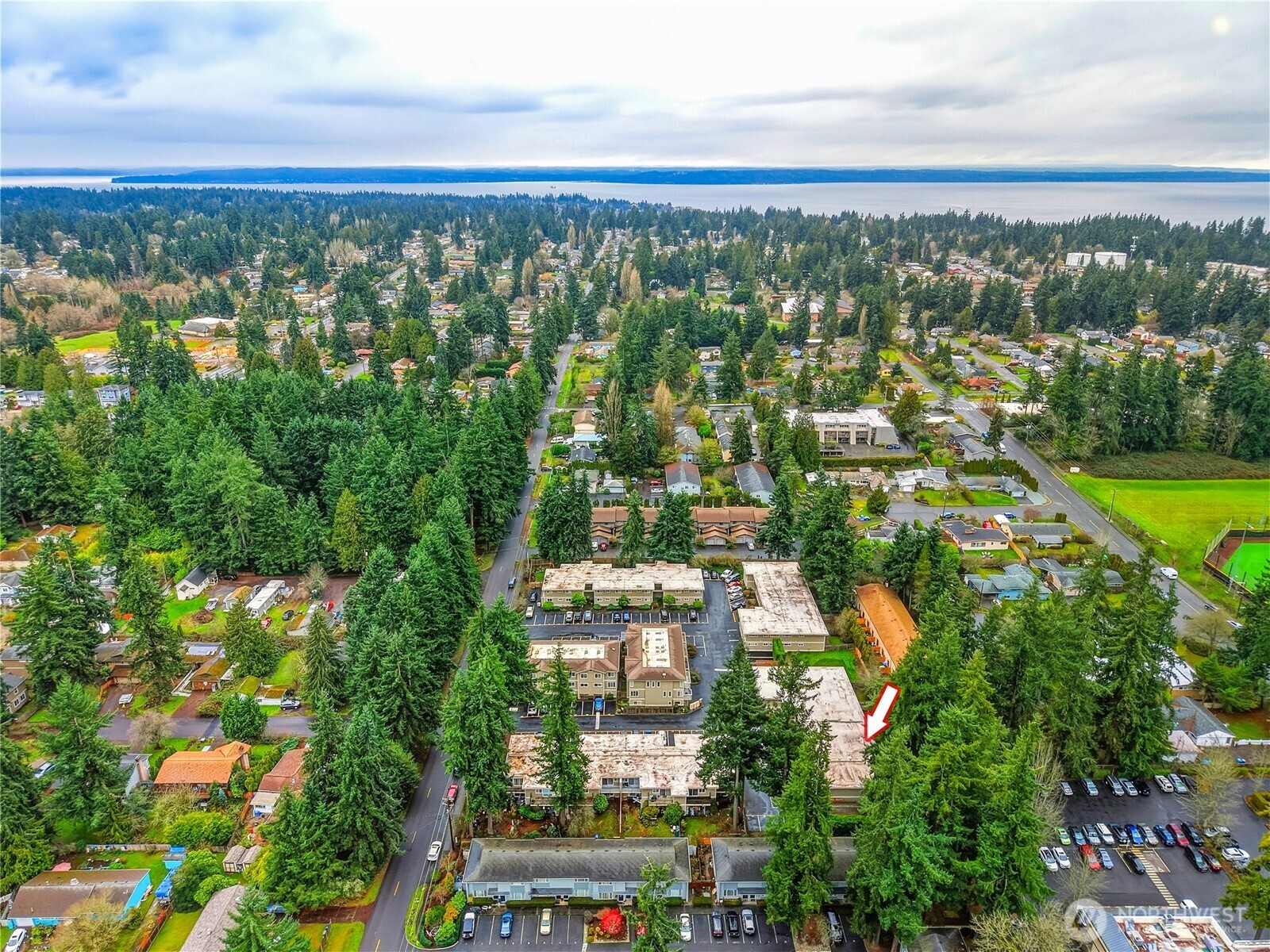 7809 218th Street Southwest, Unit 12 Edmonds, WA 98026 - Photo 33 of 34 an aerial view of residential building with outdoor space and trees