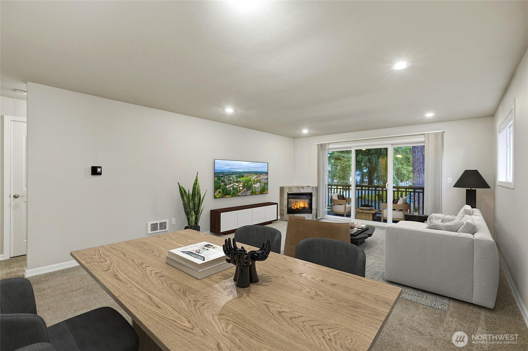 7809 218th Street Southwest, Unit 12 Edmonds, WA 98026 - Photo 6 of 34 a living room with furniture and a flat screen tv